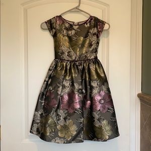 gray floral dress with purple bow in the back